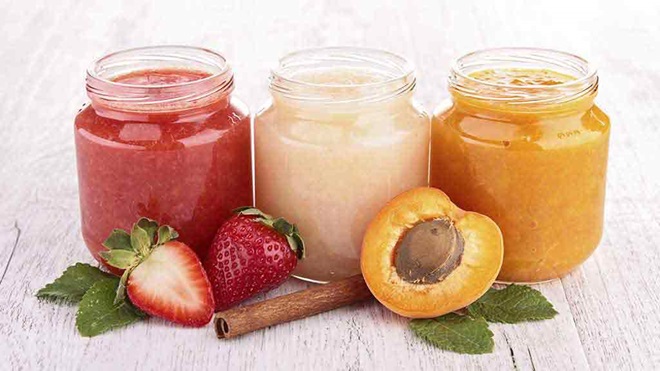 jars full of pureed fruit
